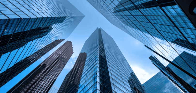 Modern corporate skyscrapers representing corporations and their legal representation rights under civil procedures law
