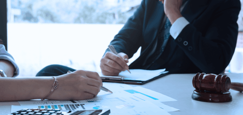 Lawyer consulting a client about tax assessment appeal in the UAE
