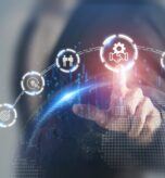 Businessman touching virtual icons representing business merger and acquisition process