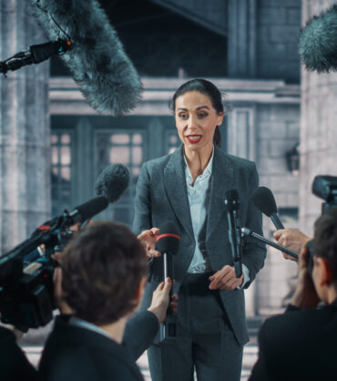 Organization,Representative,Answering,Press,Questions,And,Giving,Interview,Outside,A