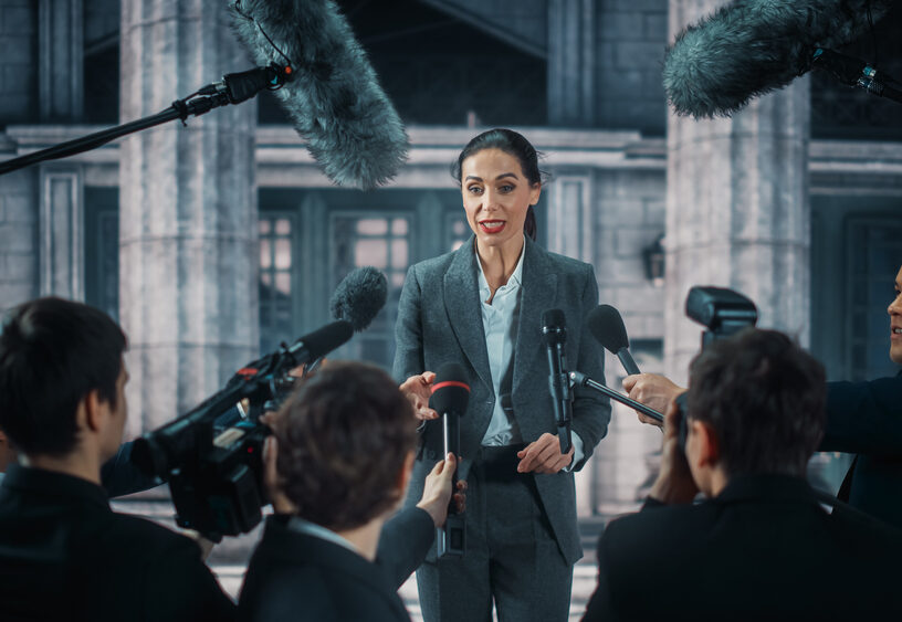 Organization,Representative,Answering,Press,Questions,And,Giving,Interview,Outside,A Organization,Representative,Answering,Press,Questions,And,Giving,Interview,Outside,A