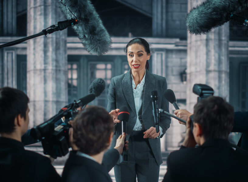 Organization,Representative,Answering,Press,Questions,And,Giving,Interview,Outside,A Organization,Representative,Answering,Press,Questions,And,Giving,Interview,Outside,A